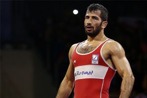 برای رسیدن به سکوی المپیک با تمام توان روی تشک می‌روم