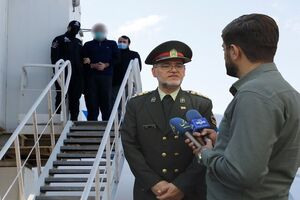 قاتل فراری به کشور باز گردانده شد